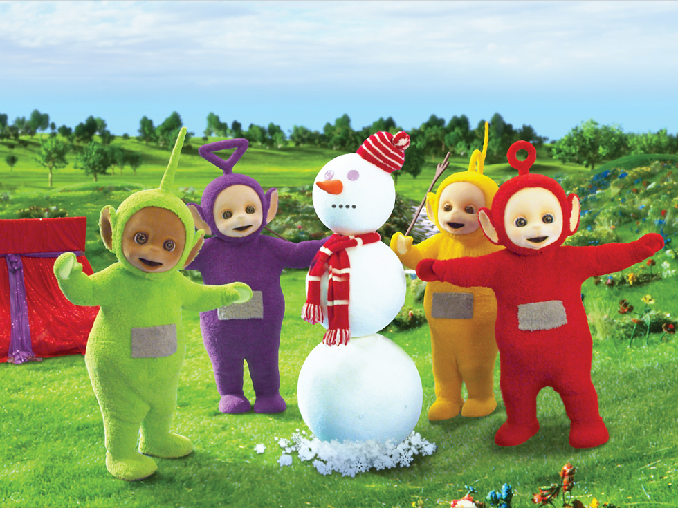 All four Teletubbies pose with a snowman.