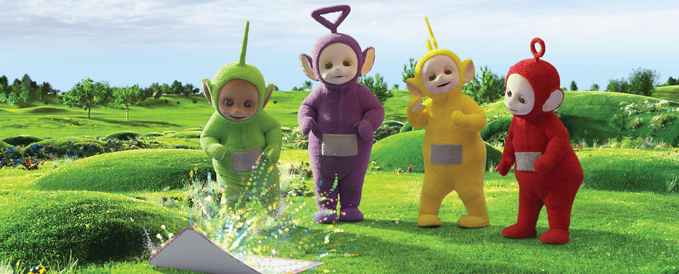 All four Teletubbies stand beside an open envelope with confetti.
