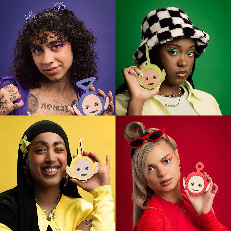Four models holding different colour makeup compacts: purple, green, yellow, and red.