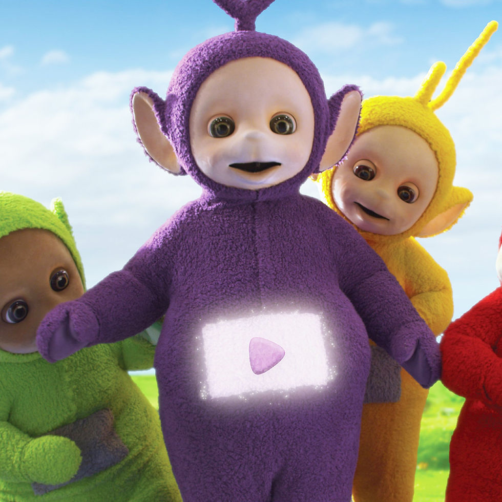 a purple character with a glowing tv screen on its tummy standing with friends