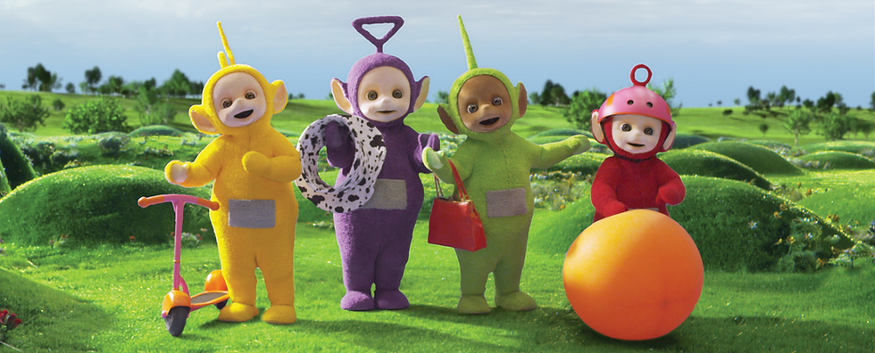 Laa-Laa, Tinky Winky, Dipsy, and Po standing on the grass with their favourite things.